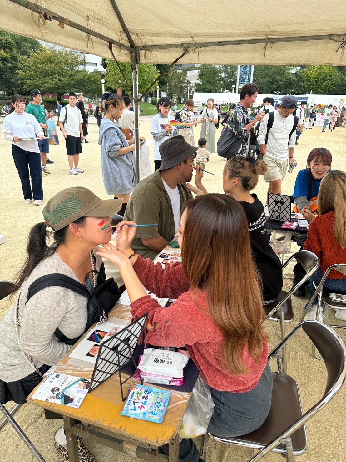 face painting at IGLTA pavilion