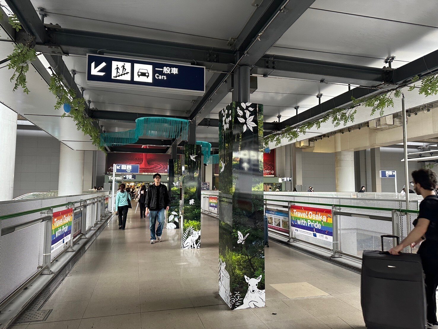 Travel Osaka with Pride message at Kansai International Airport